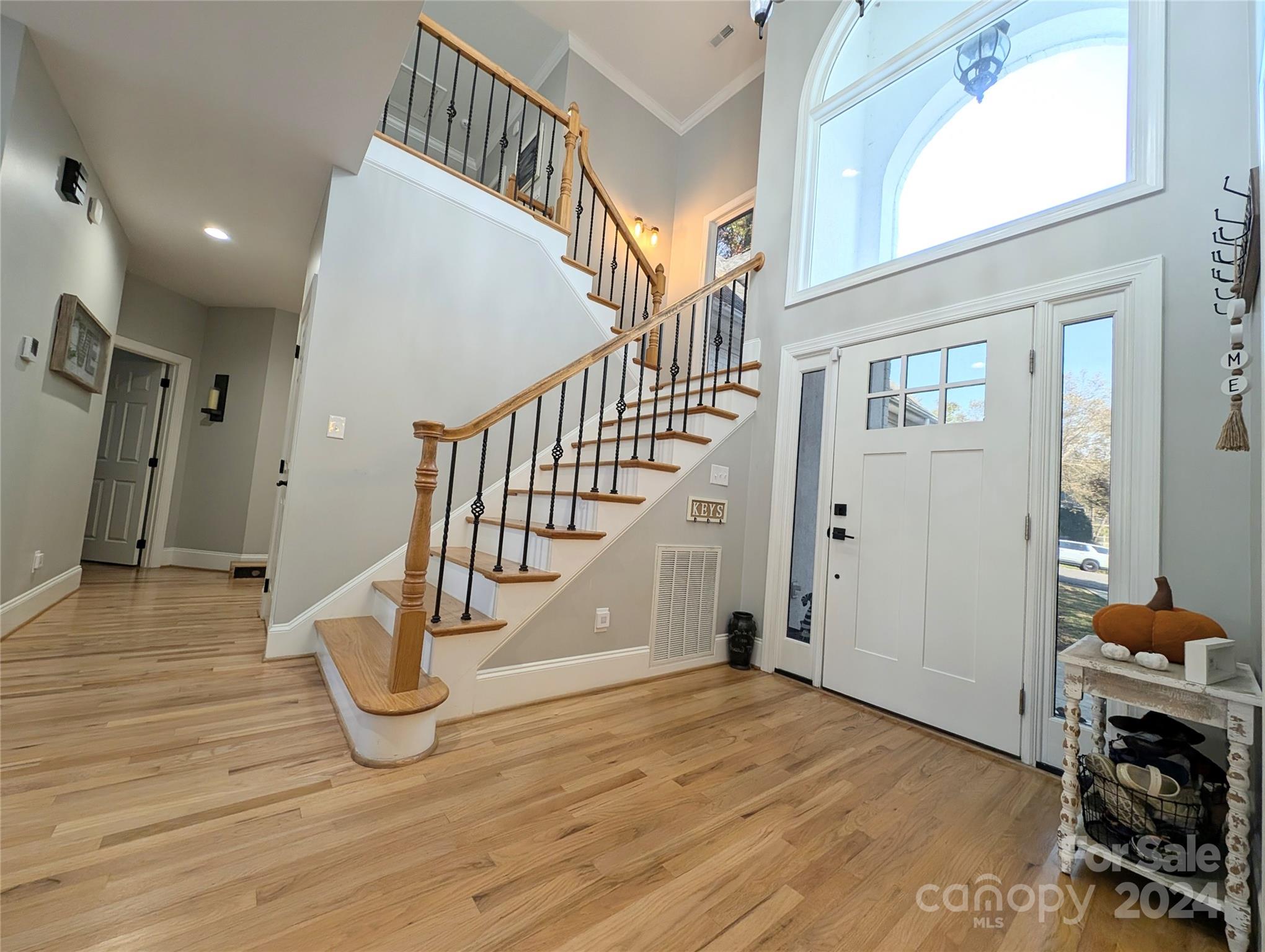 640 Amberly Crossing Fort Mill, SC 29708 - Photo 6 of 45 a view of entryway and hall with wooden floor