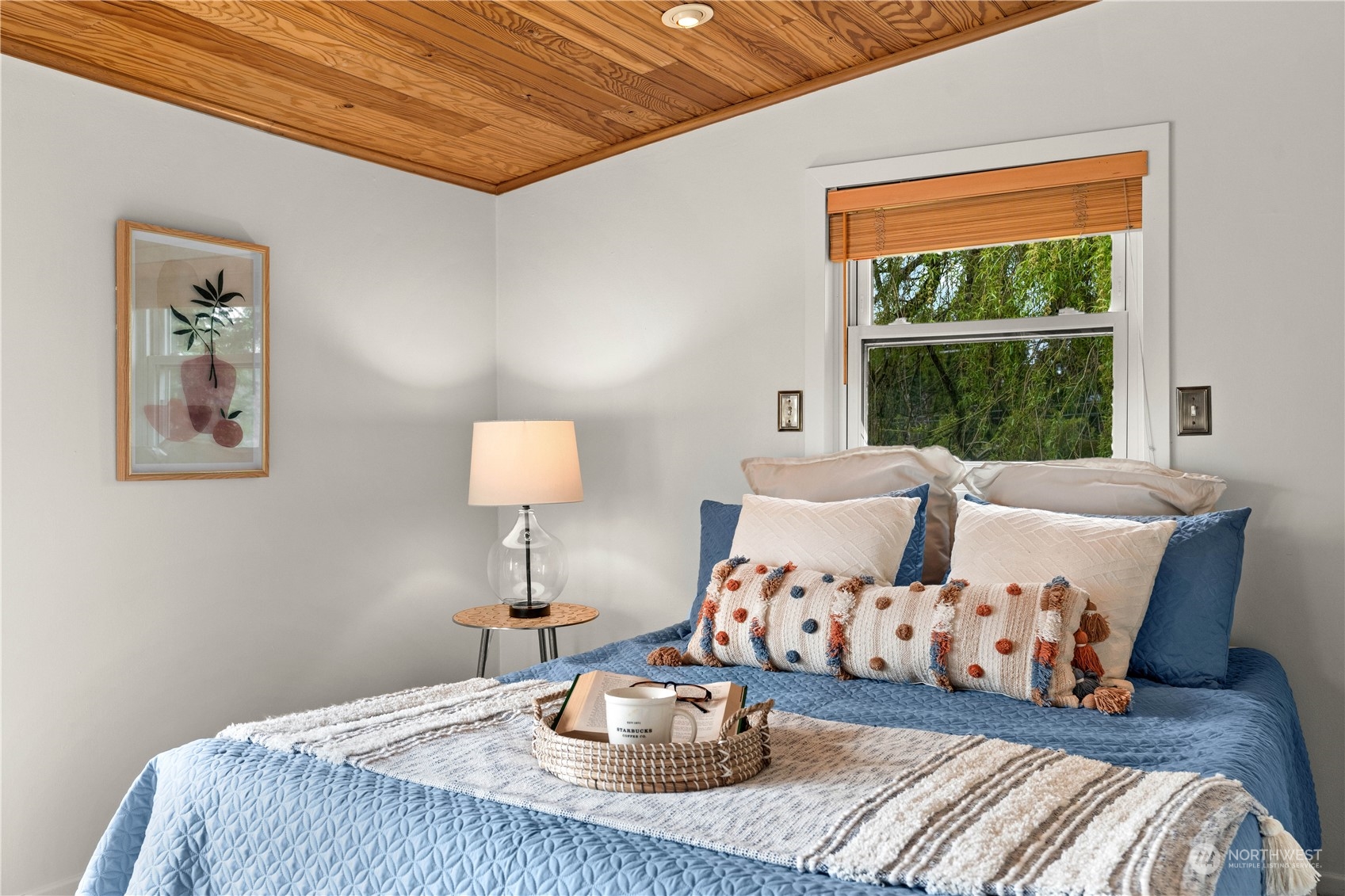 9721 Fremont Avenue North Seattle, WA 98103 - Photo 14 of 27 a living room with furniture lamp and a large window