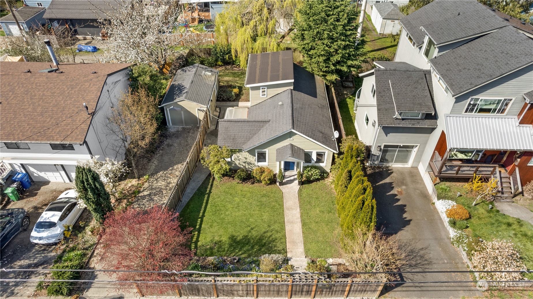 9721 Fremont Avenue North Seattle, WA 98103 - Photo 26 of 27 an aerial view of a residential apartment building with a yard