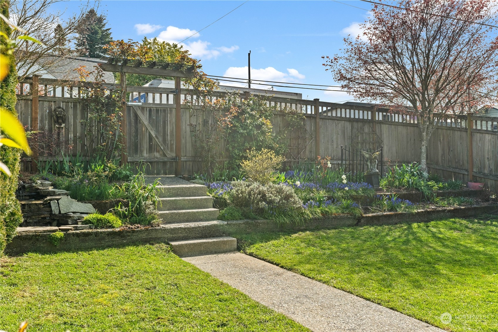 9721 Fremont Avenue North Seattle, WA 98103 - Photo 3 of 27 a view of a garden