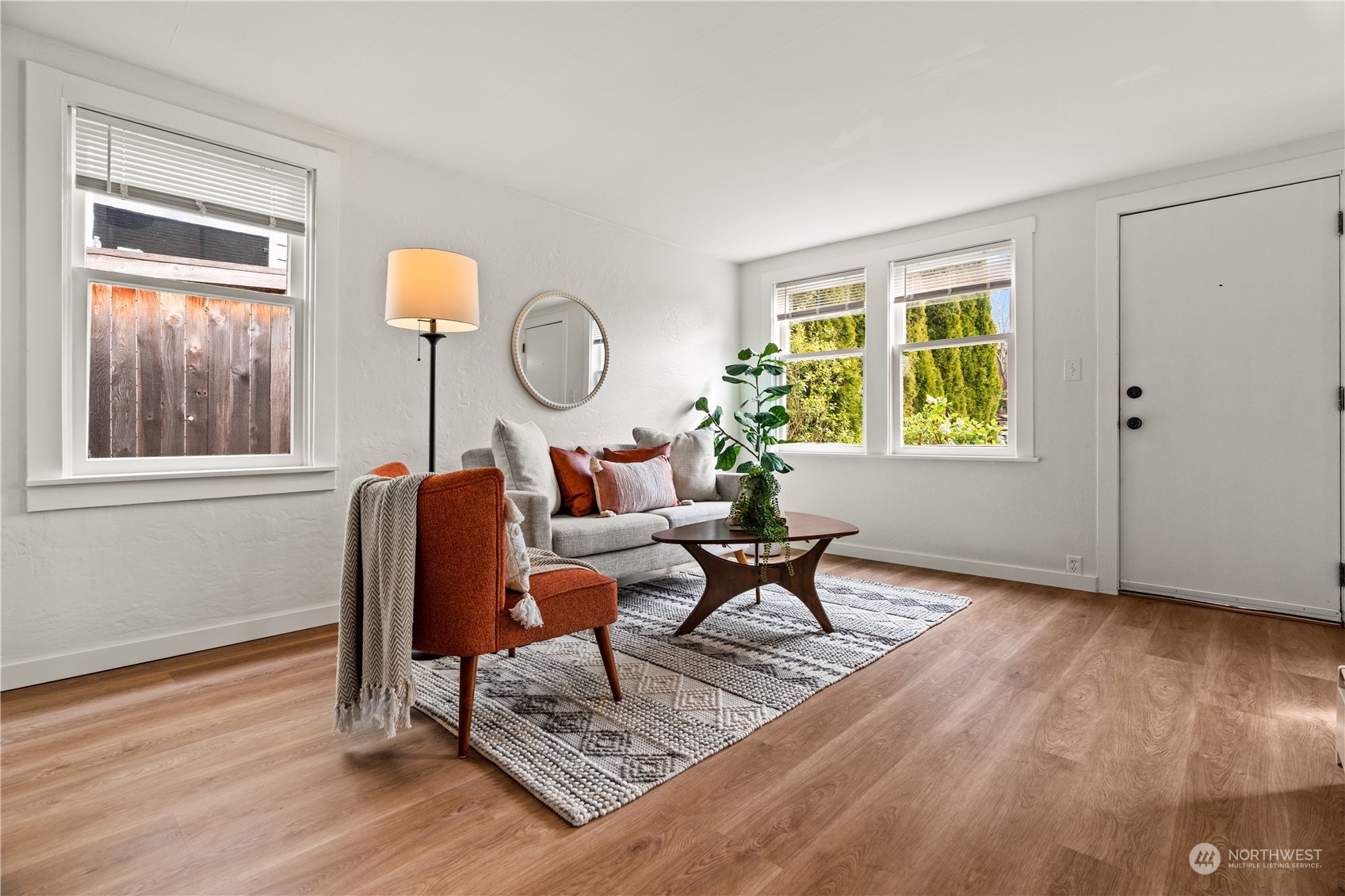 9721 Fremont Avenue North Seattle, WA 98103 - Photo 10 of 27 a living room with furniture and a window