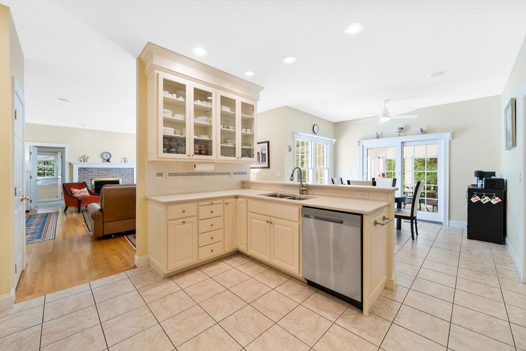 17 Bellows Road Wilbraham, MA 01095 - Photo 8 of 42 a kitchen with a sink and chairs
