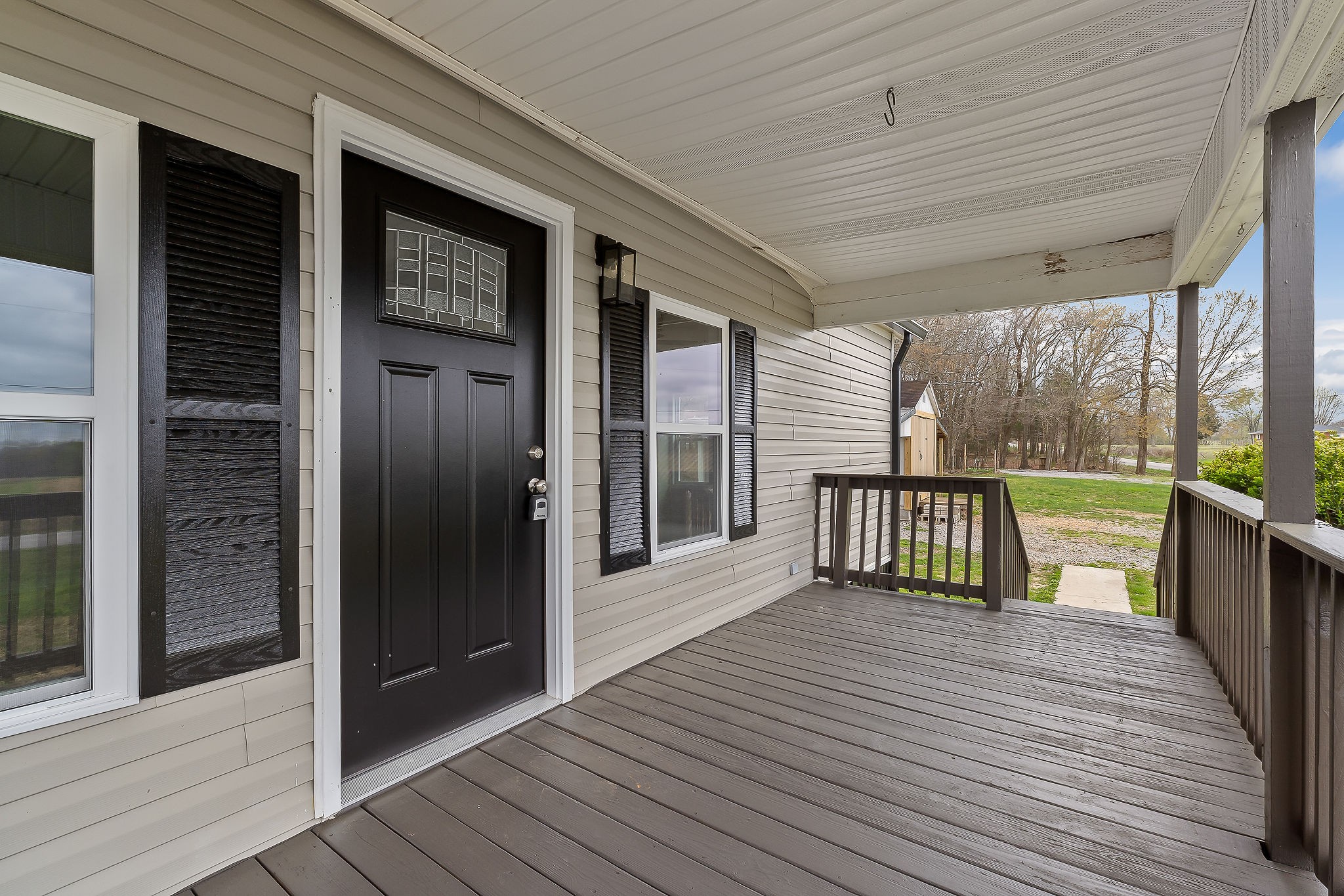 479 Old Bildad Road Smithville, TN 37166 - Photo 17 of 30 a view of a balcony with wooden floor