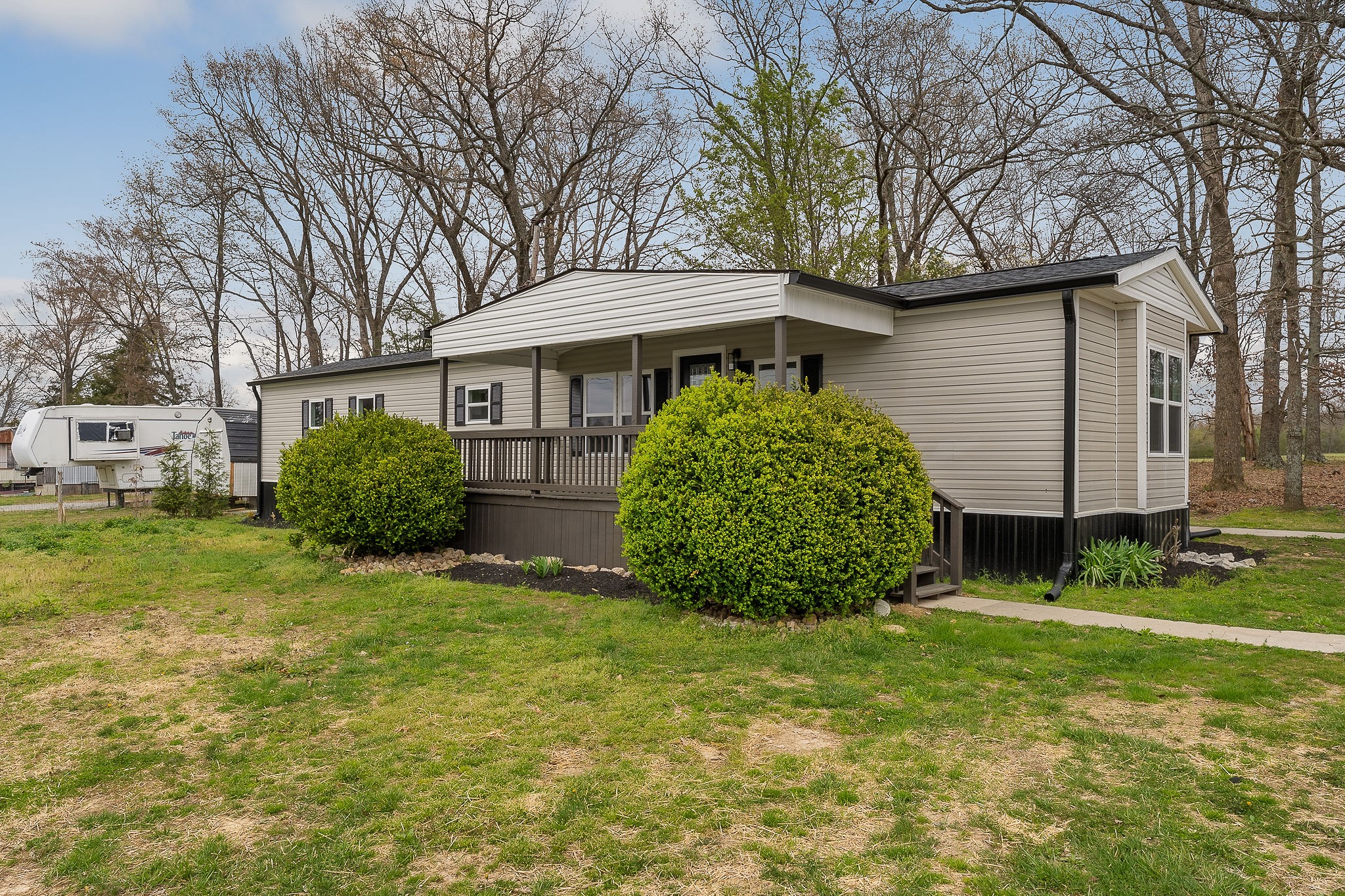 479 Old Bildad Road Smithville, TN 37166 - Photo 19 of 30 a view of a house with a yard and plants