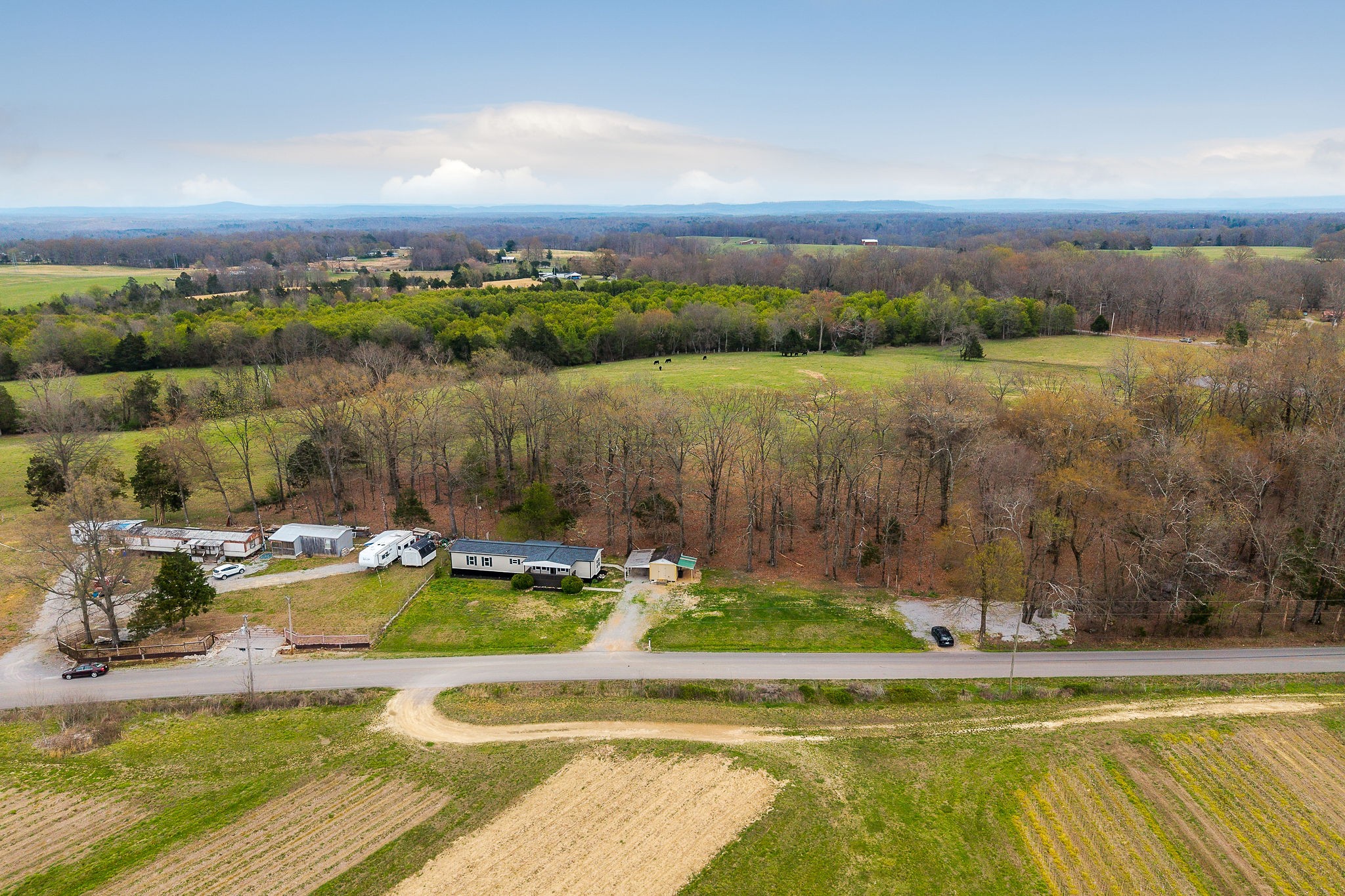 479 Old Bildad Road Smithville, TN 37166 - Photo 24 of 30 a view of a lake with houses in the back