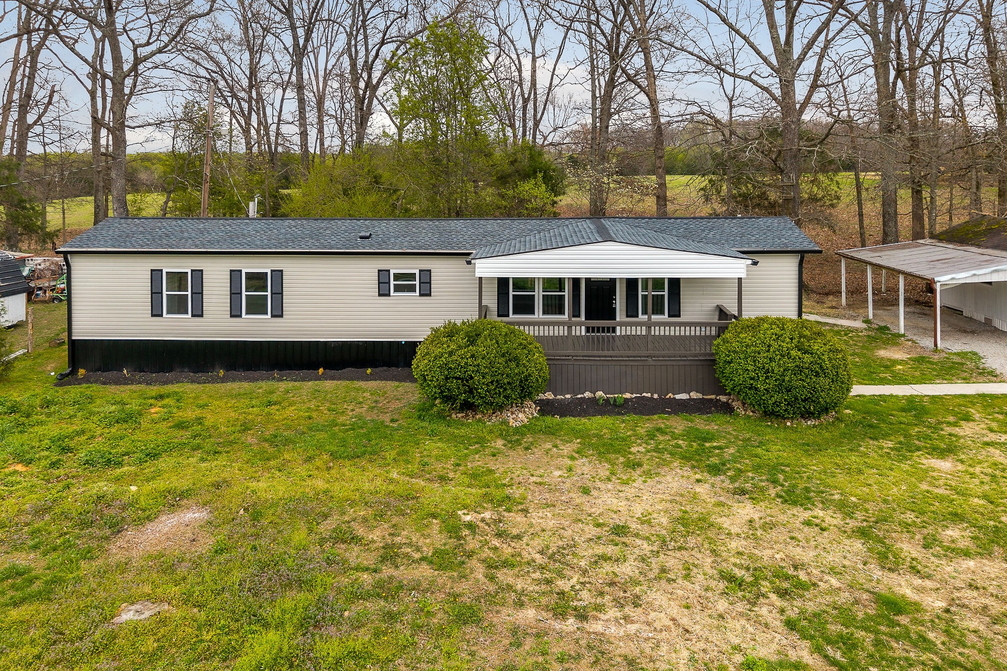 479 Old Bildad Road Smithville, TN 37166 - Photo 27 of 30 a view of a house with garden and trees