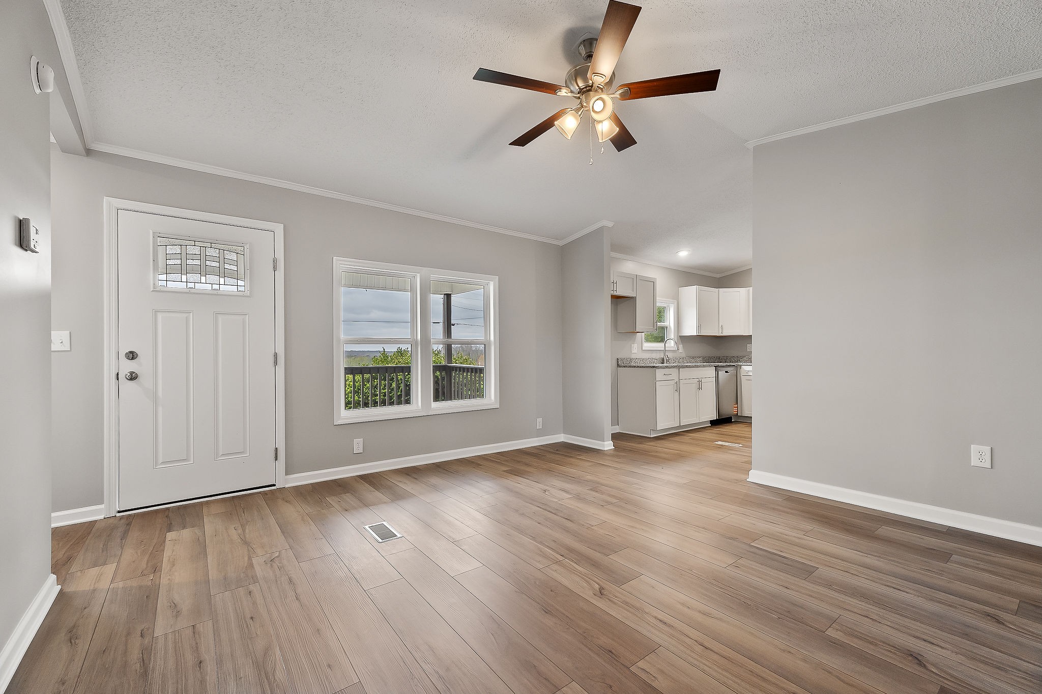 479 Old Bildad Road Smithville, TN 37166 - Photo 3 of 30 wooden floor in an empty room with a window