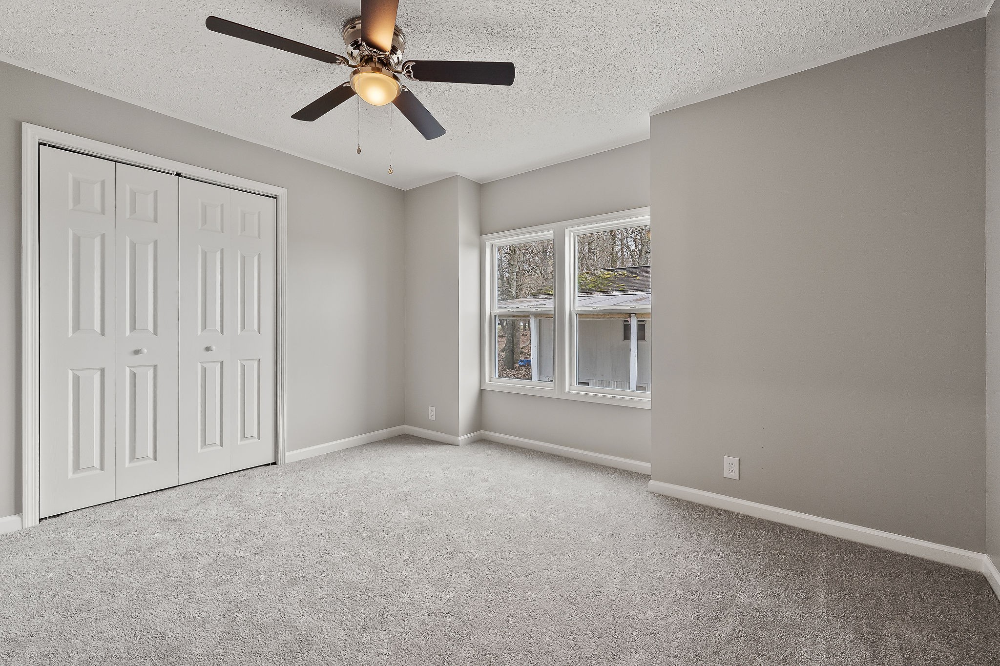 479 Old Bildad Road Smithville, TN 37166 - Photo 8 of 30 an empty room with chandelier fan