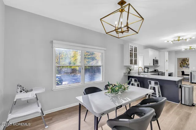 a bed room with two beds and a window