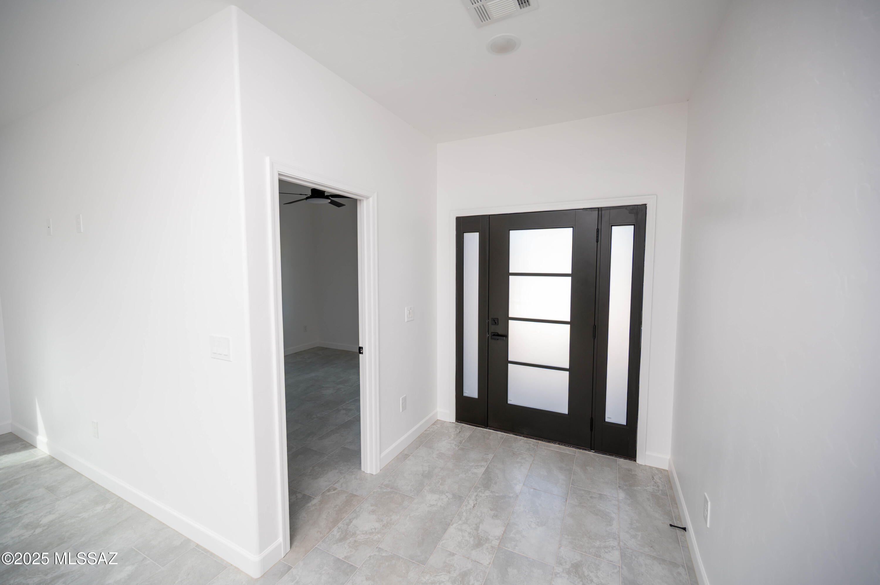 1781 Elder Court Rio Rico, AZ 85648 - Photo 34 of 50 an empty room with windows and closet