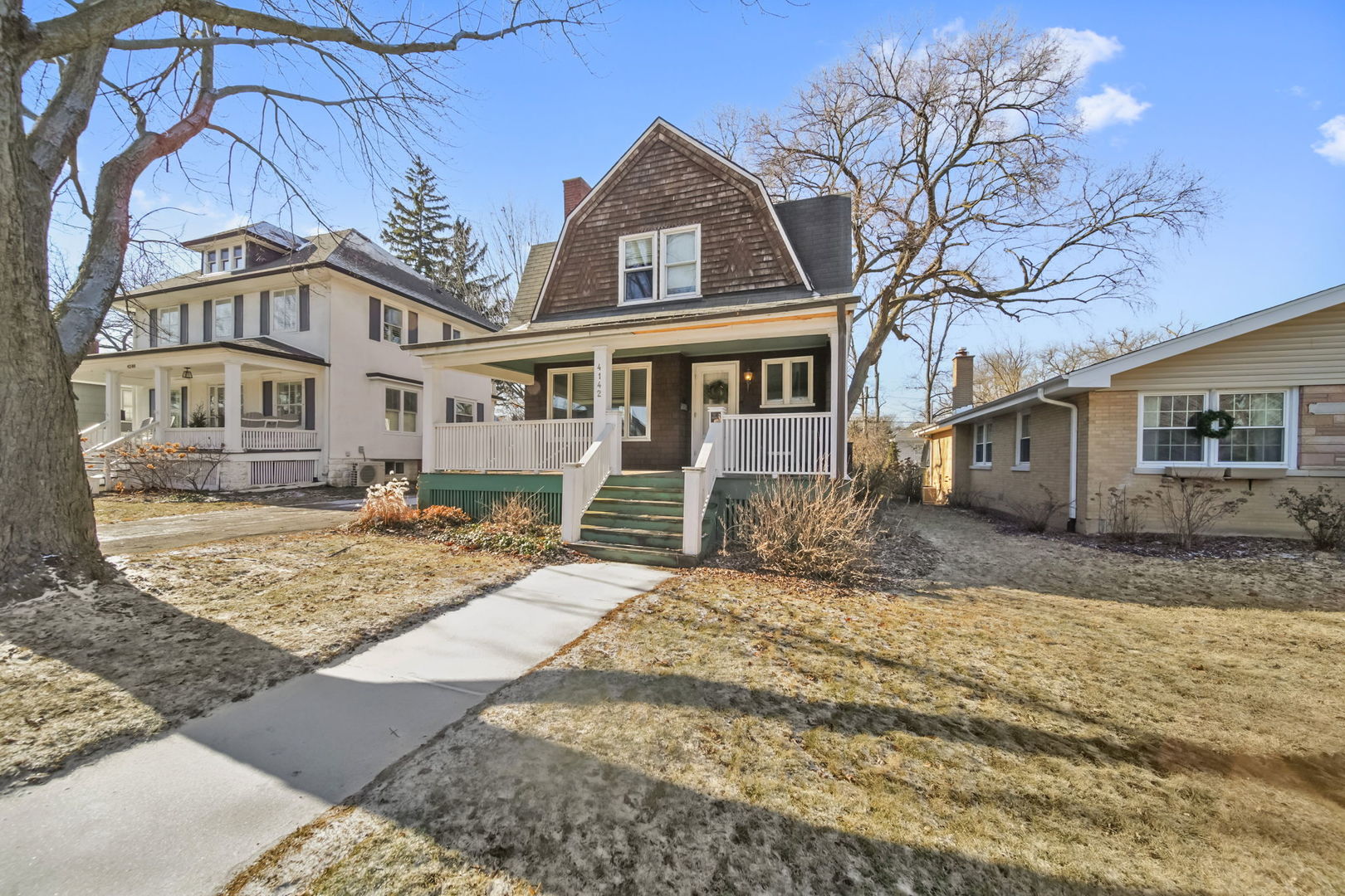 4142 Wolf Road Western Springs, IL 60558 - Photo 1 of 34 front view of a house with a yard