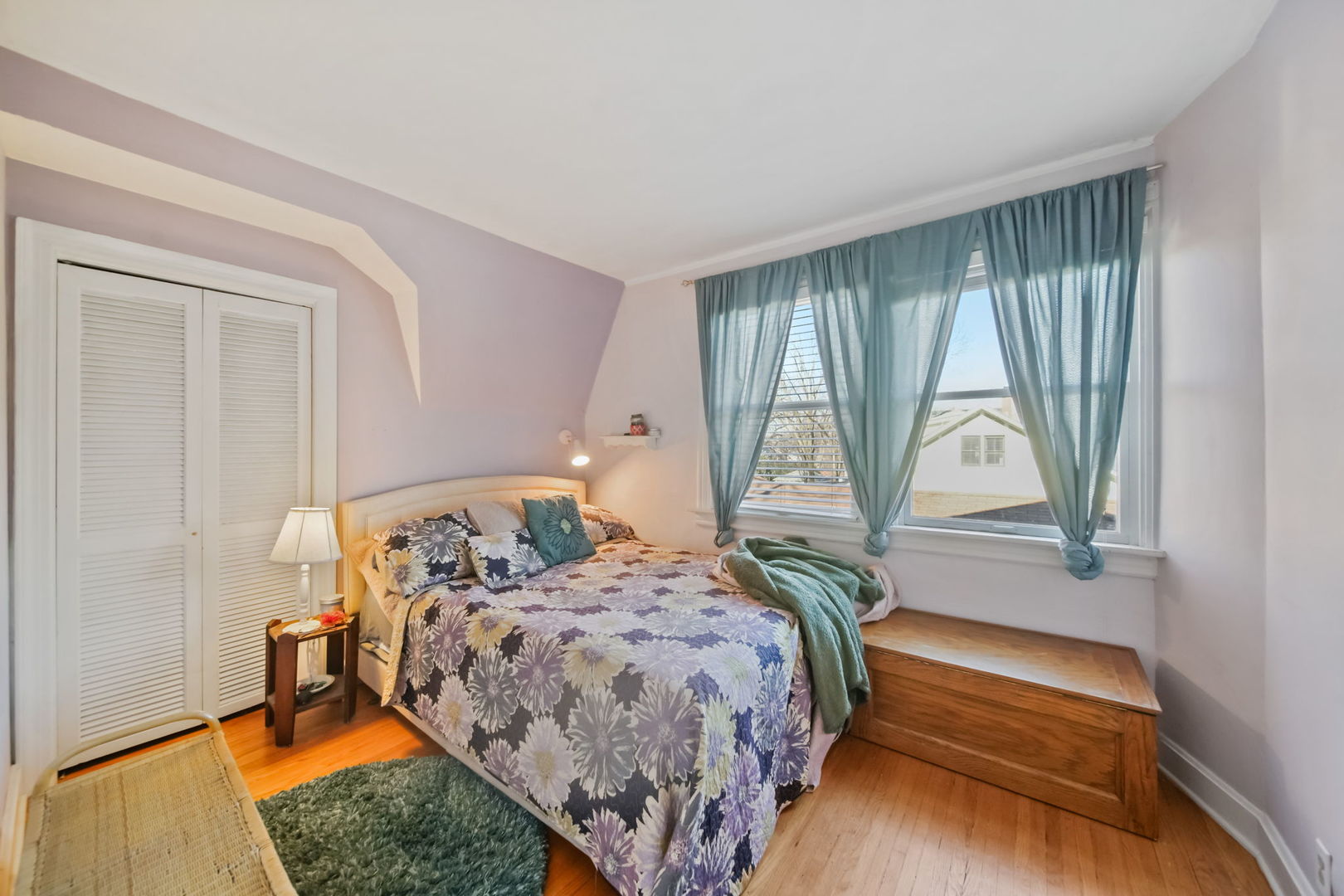 4142 Wolf Road Western Springs, IL 60558 - Photo 14 of 34 a bedroom with a bed and a window