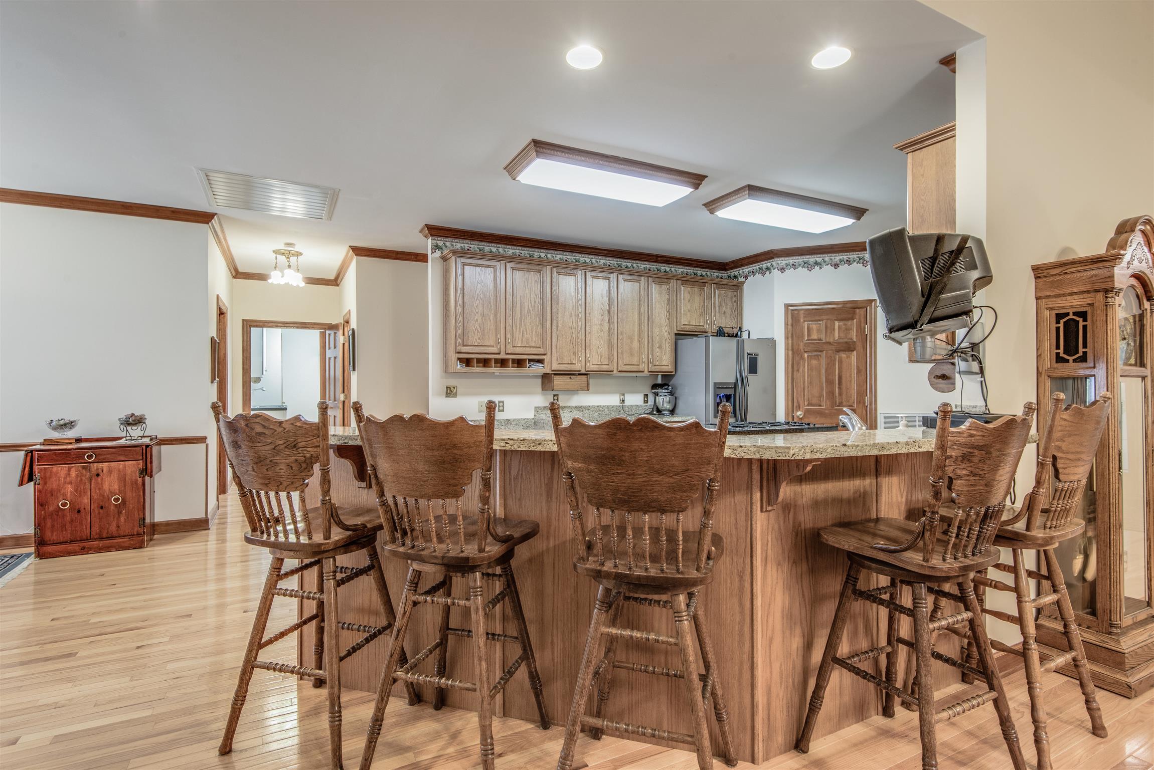 8627 Taliaferro Road Eagleville, TN 37060 - Photo 11 of 30 The chef has plenty of room to place meals with this lovely bar over looking the family room and breakfast room