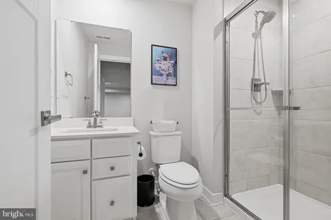 a view of roof deck with a barbeque and wooden stairs