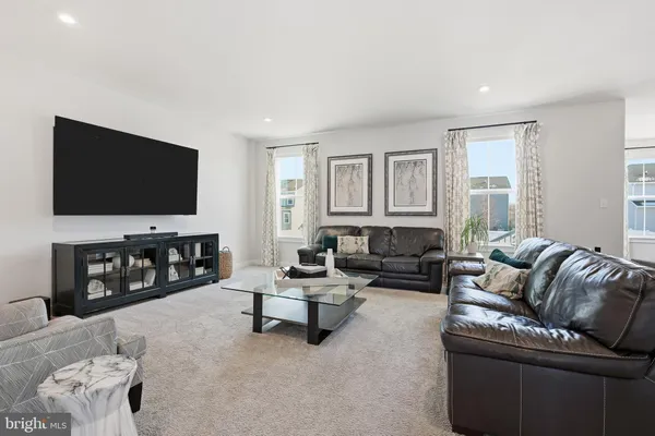 a living room with furniture and a couch