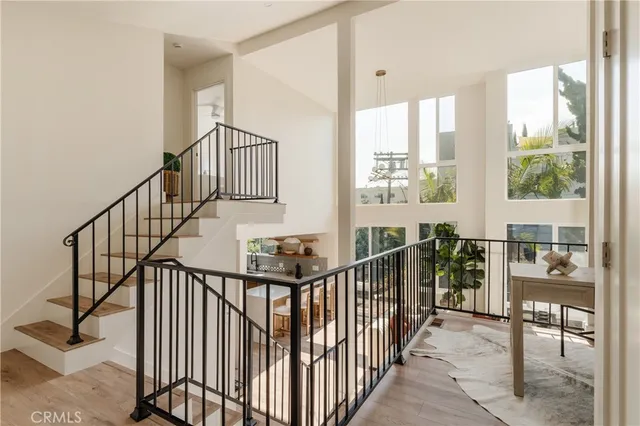 a bathroom with a sink a mirror and shower