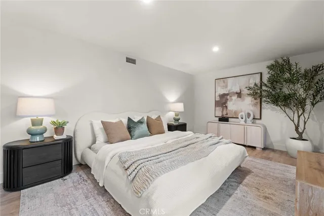 a view of a living room and entryway