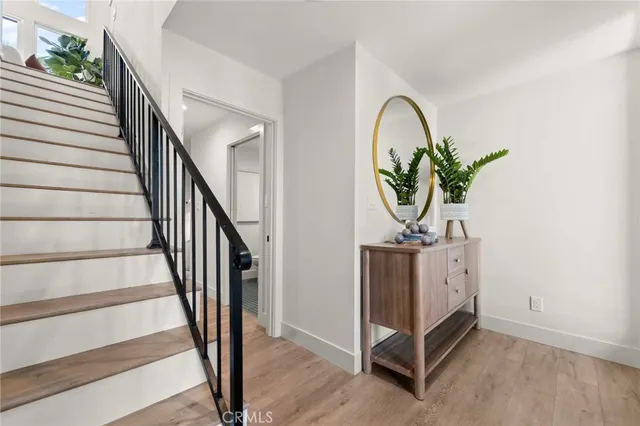 a bathroom with a toilet and a bathtub