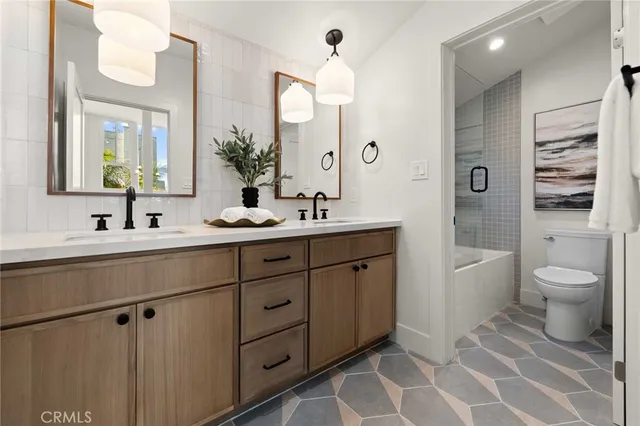 a bedroom with a bed and glass window