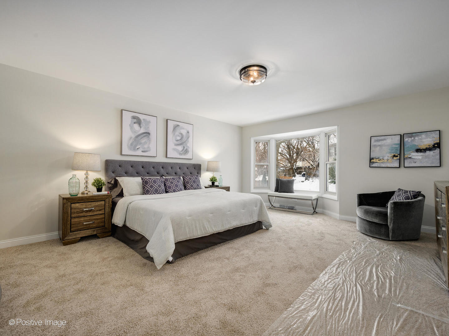 526 Thomas Road Bolingbrook, IL 60440 - Photo 13 of 23 a spacious bedroom with a bed and window
