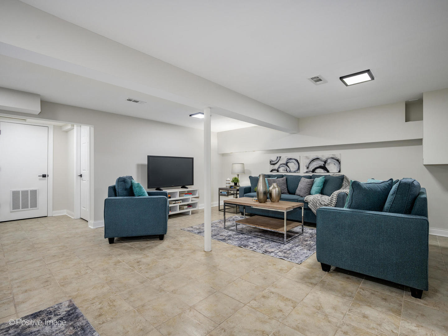526 Thomas Road Bolingbrook, IL 60440 - Photo 20 of 23 a living room with furniture and a flat screen tv