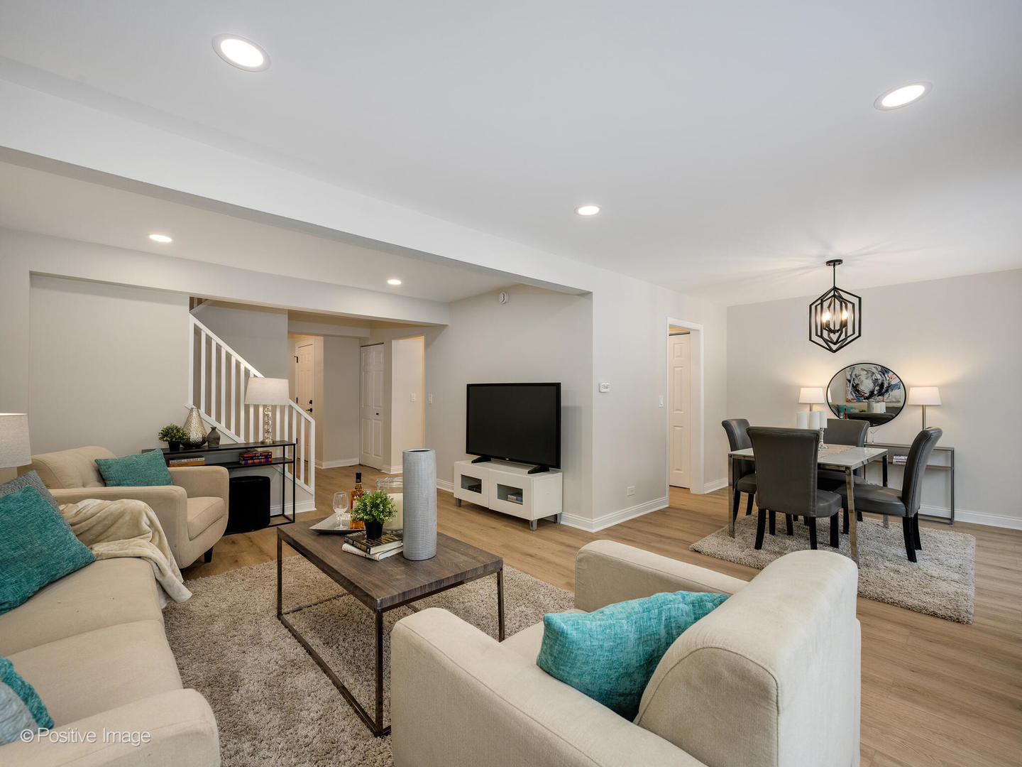 526 Thomas Road Bolingbrook, IL 60440 - Photo 5 of 23 a living room with furniture and a flat screen tv
