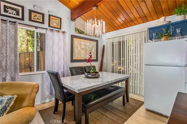 a view of a livingroom with furniture and window