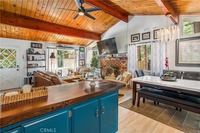 a kitchen with sink and refrigerator