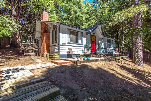 a view of a house with basketball court
