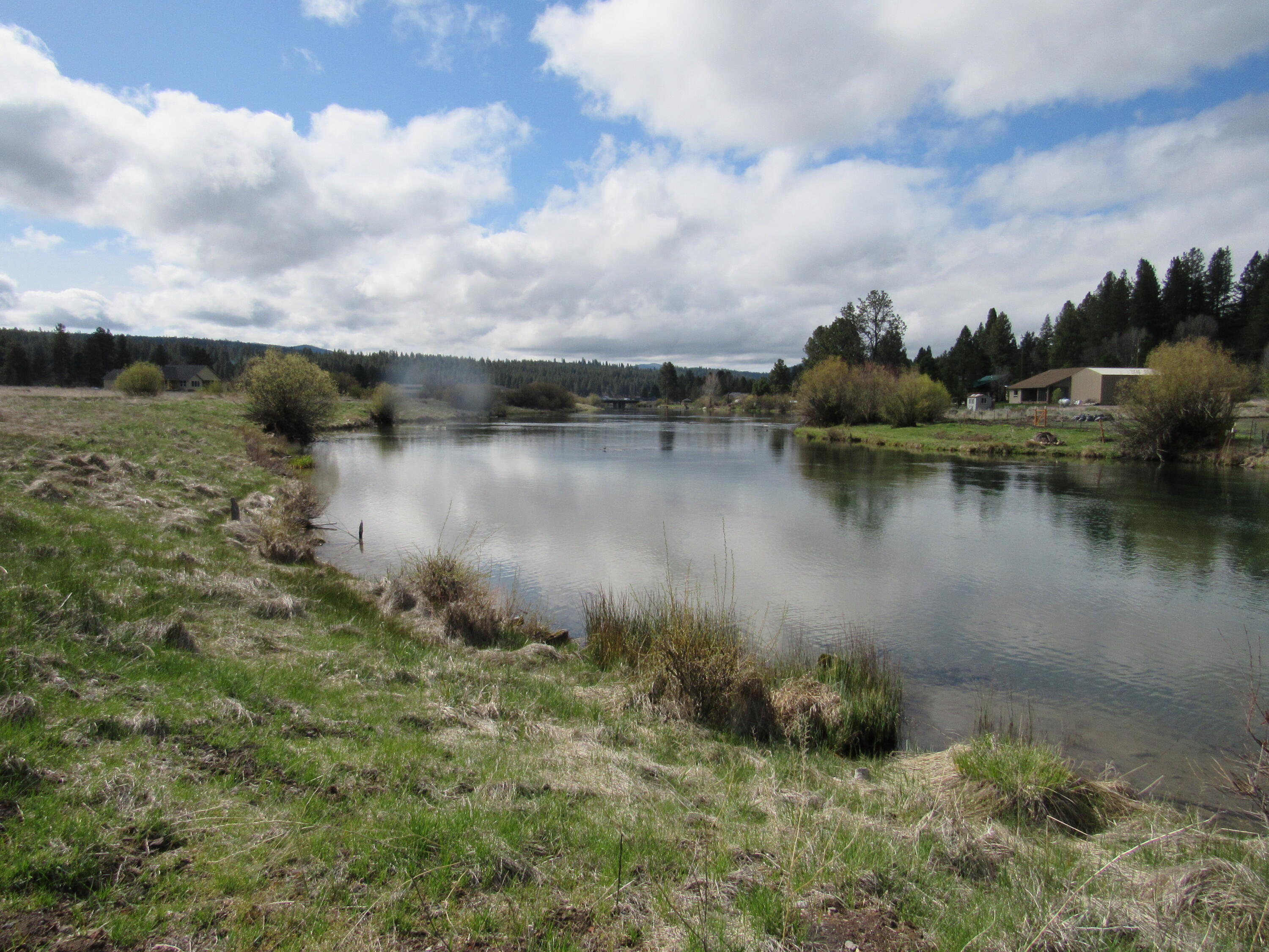 0 Cattle Drive, Unit 883876 Chiloquin, OR 97624 - Photo 5 of 8 a view of a lake with houses in back