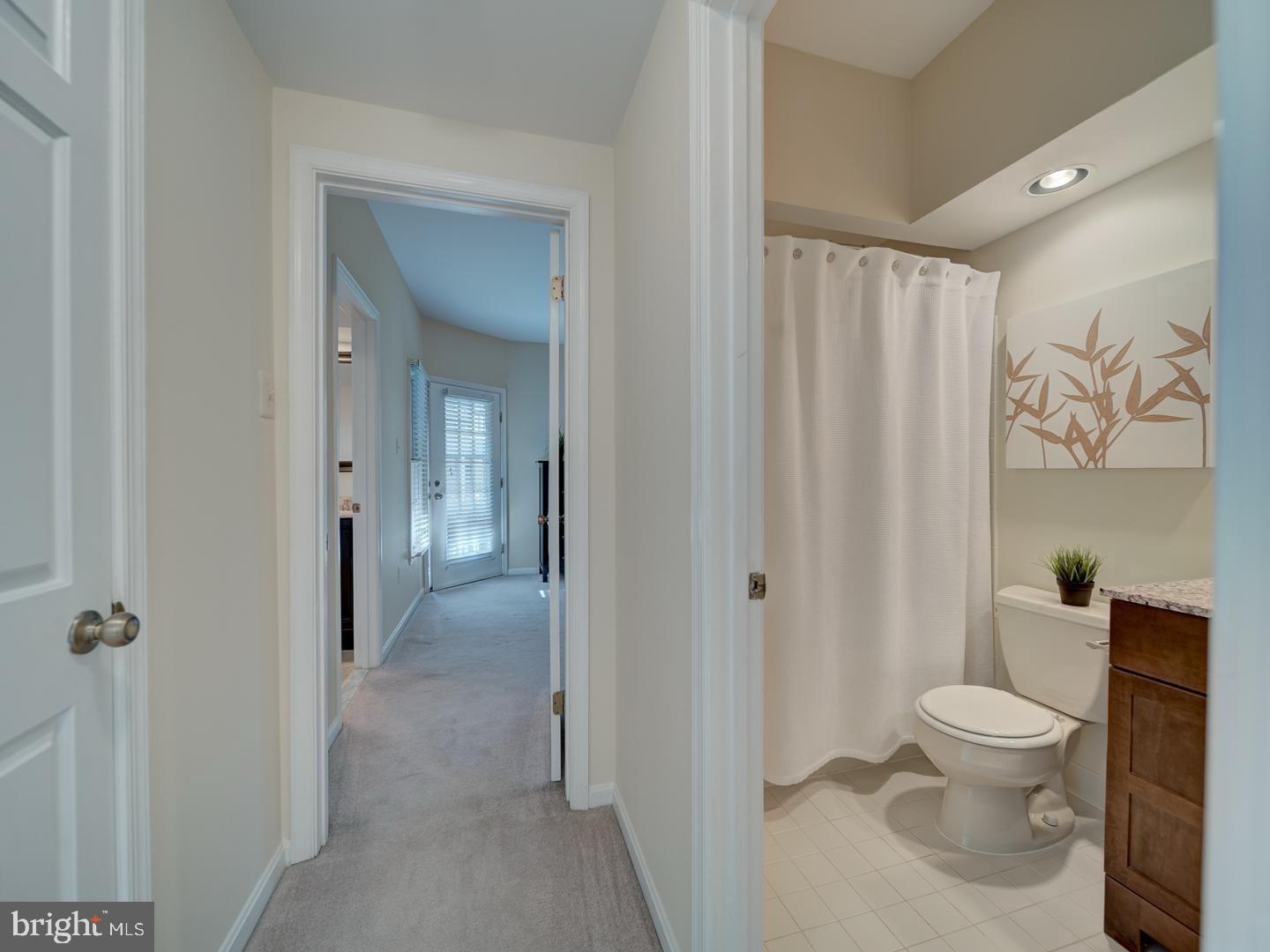 2708 Summerview Way Annapolis, MD 21401 - Photo 13 of 24 Bright and inviting bathroom entrance.