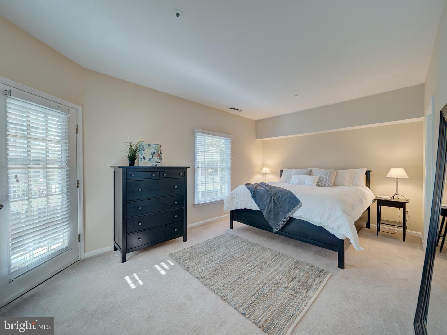 2708 Summerview Way Annapolis, MD 21401 - Photo 14 of 24 Serene bedroom with natural light.