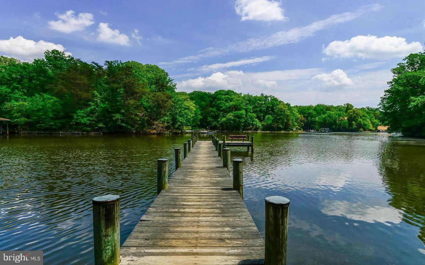 2708 Summerview Way Annapolis, MD 21401 - Photo 20 of 24 Tranquil dock by serene waterscape.