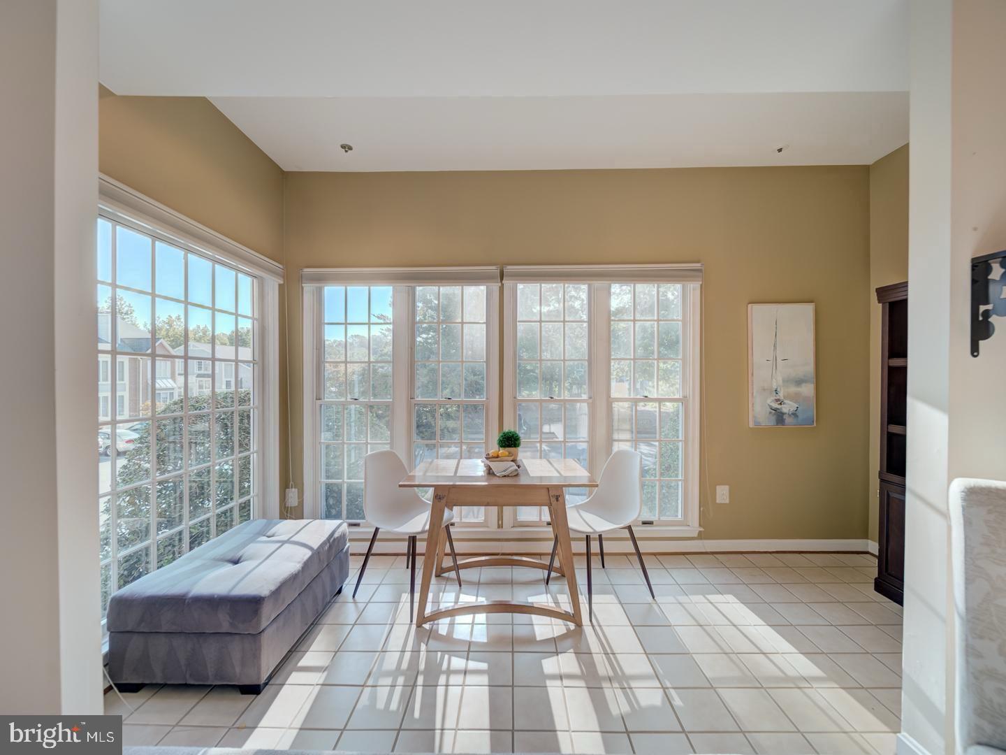 2708 Summerview Way Annapolis, MD 21401 - Photo 4 of 24 Sunlit dining nook with serene views.