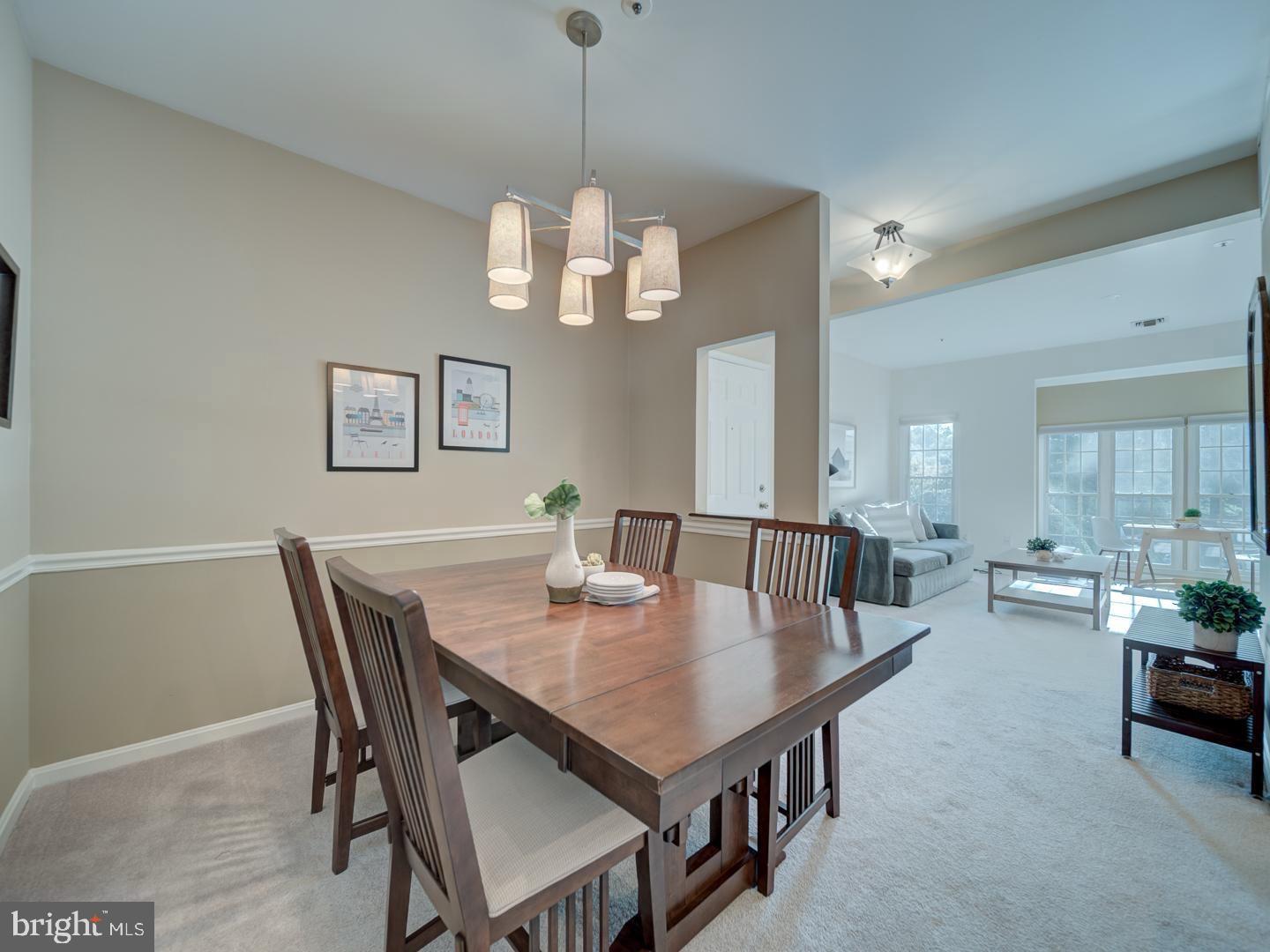 2708 Summerview Way Annapolis, MD 21401 - Photo 6 of 24 Elegant dining space with warm ambiance.