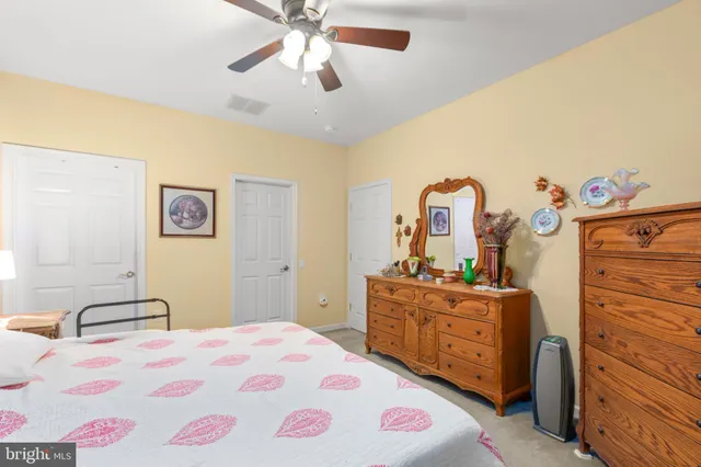 a bed room with a bed and a couch