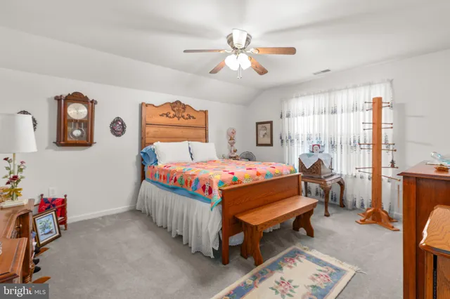 a work room with furniture and gym equipment