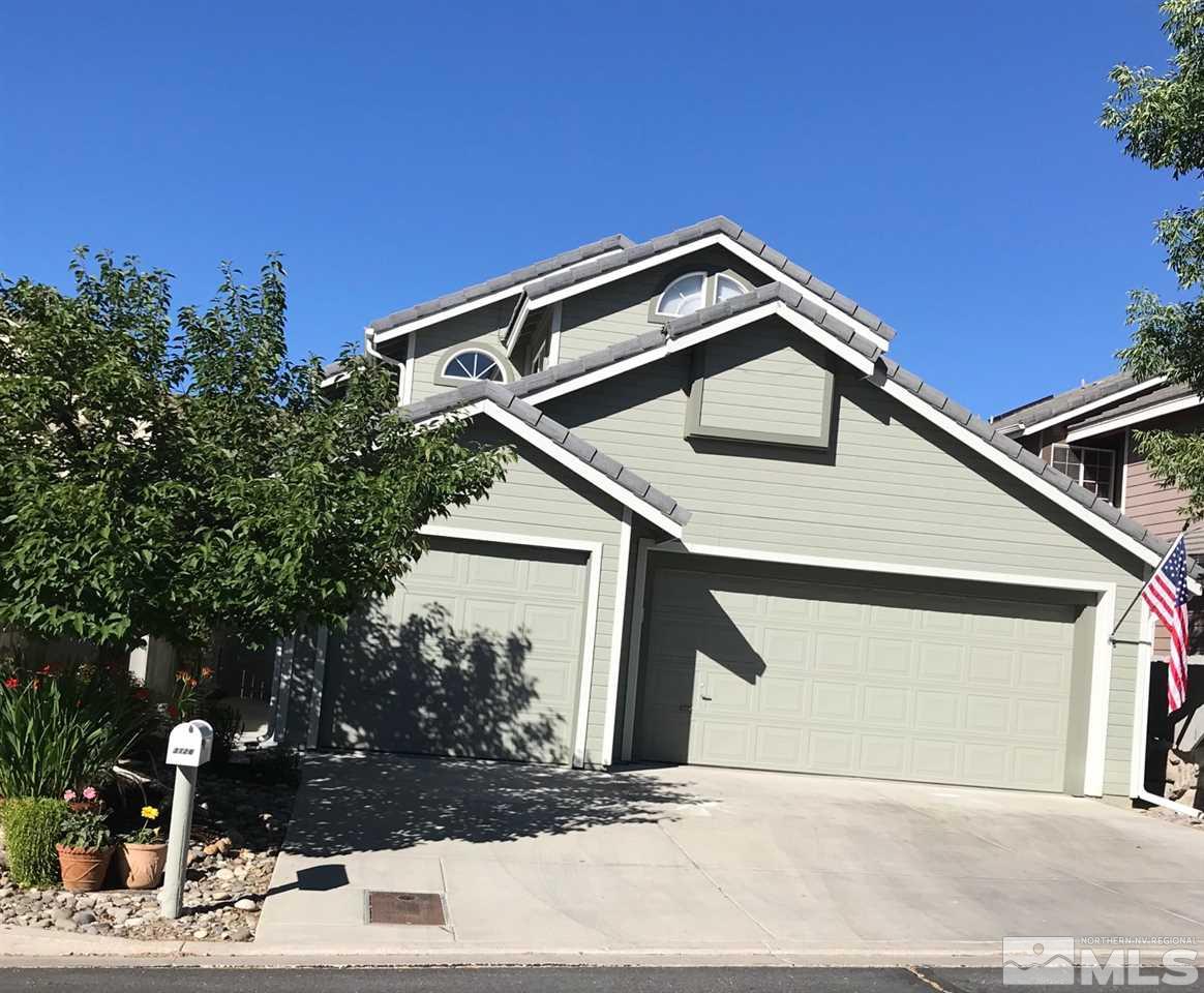 3126 Alpine Creek Road Reno, NV 89519 - Photo 1 of 25 a front view of a house with a garage