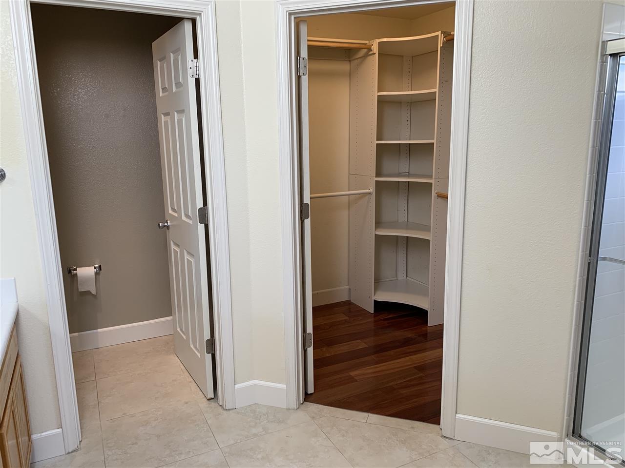 3126 Alpine Creek Road Reno, NV 89519 - Photo 15 of 25 a view of walk in closet with wooden floor