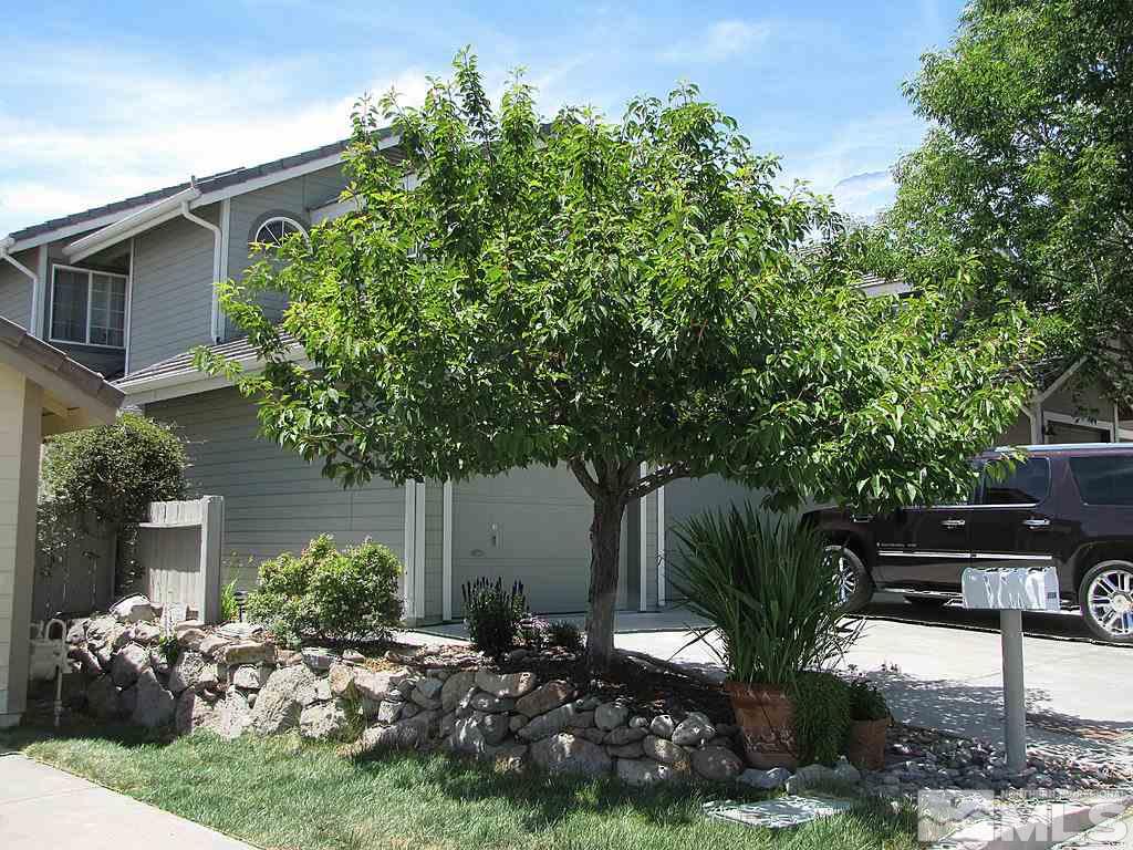 3126 Alpine Creek Road Reno, NV 89519 - Photo 2 of 25 a front view of a house with garden