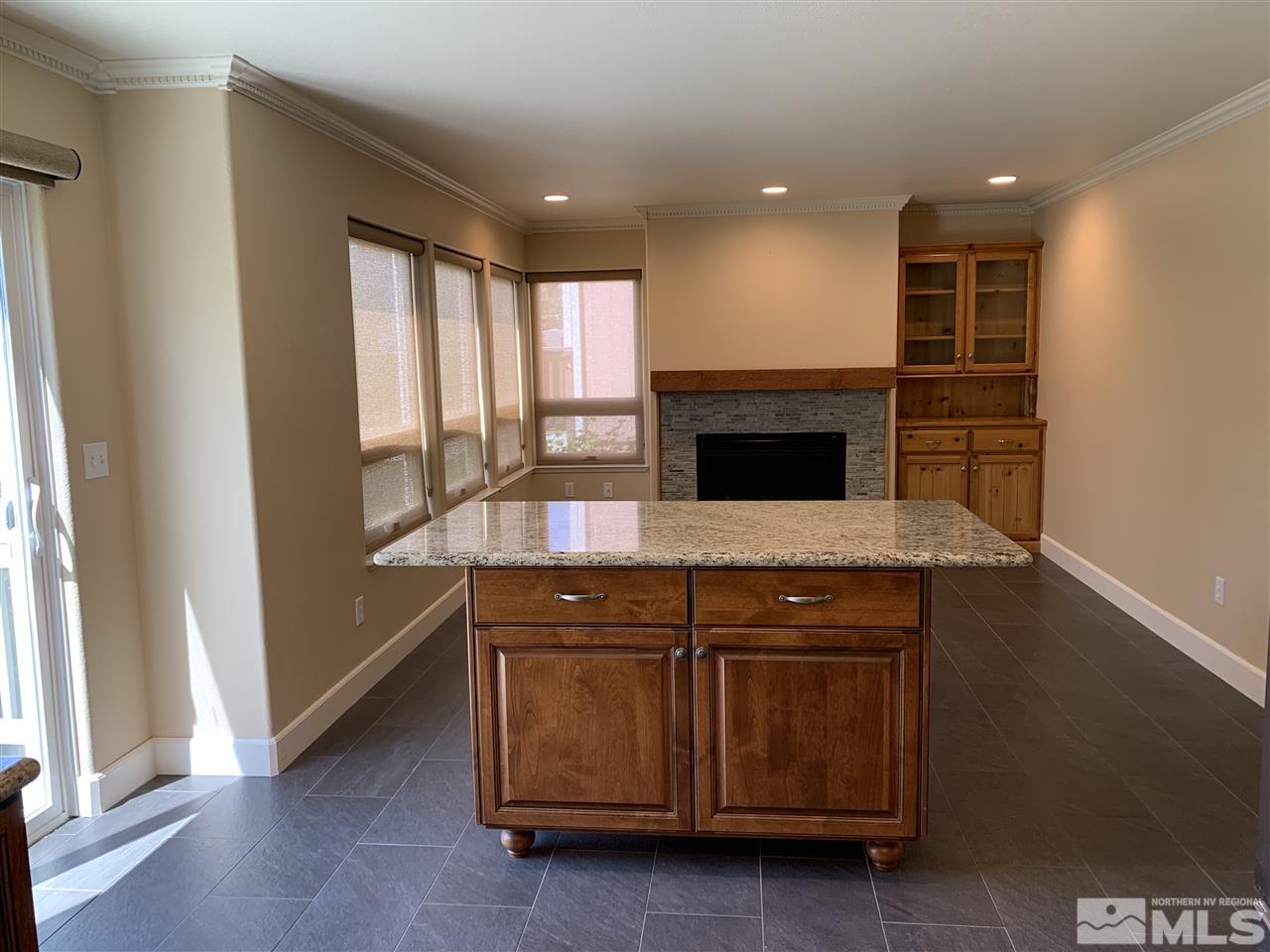 3126 Alpine Creek Road Reno, NV 89519 - Photo 8 of 25 a kitchen with a sink and a stove top oven