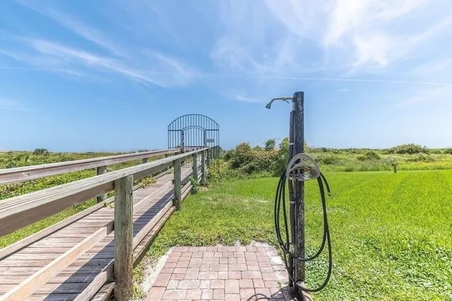 a view of a yard with an outdoor seating