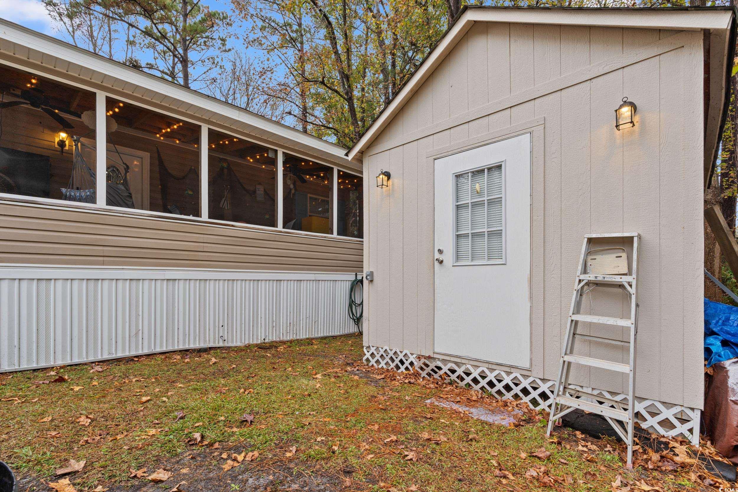 90 Offshore Drive Murrells Inlet, SC 29576 - Photo 27 of 40 Entrance to property with a sunroom