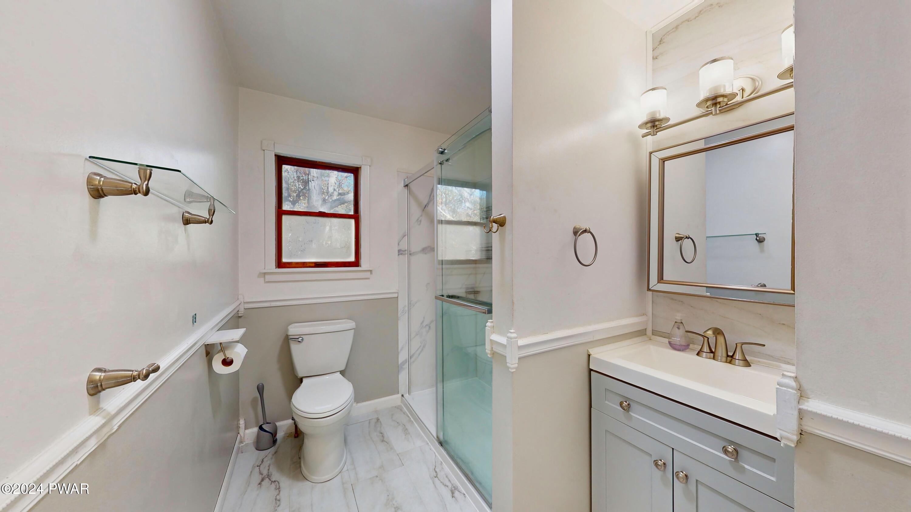 102 Maple Ridge Road Milford, PA 18337 - Photo 23 of 52 a bathroom with a sink toilet and shower