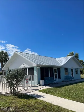 a view of a house with garden