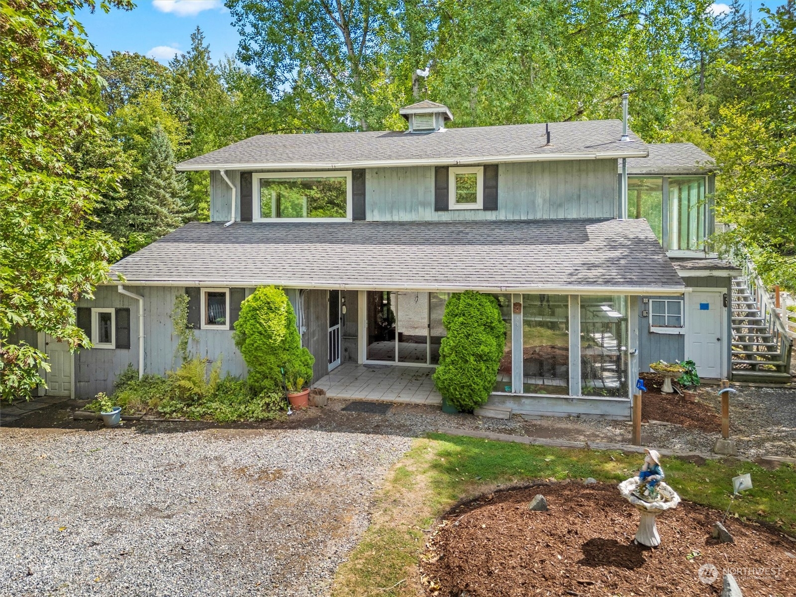 5570 Starry Road Bellingham, WA 98226 - Photo 25 of 34 a front view of a house with garden
