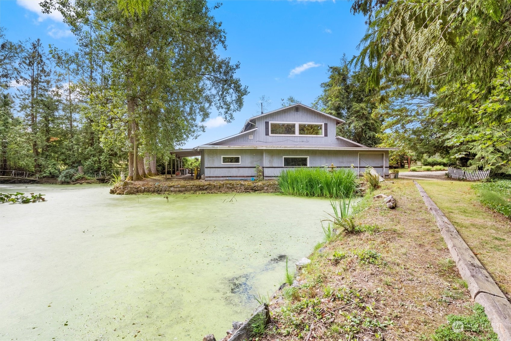 5570 Starry Road Bellingham, WA 98226 - Photo 27 of 34 a front view of a house with a yard