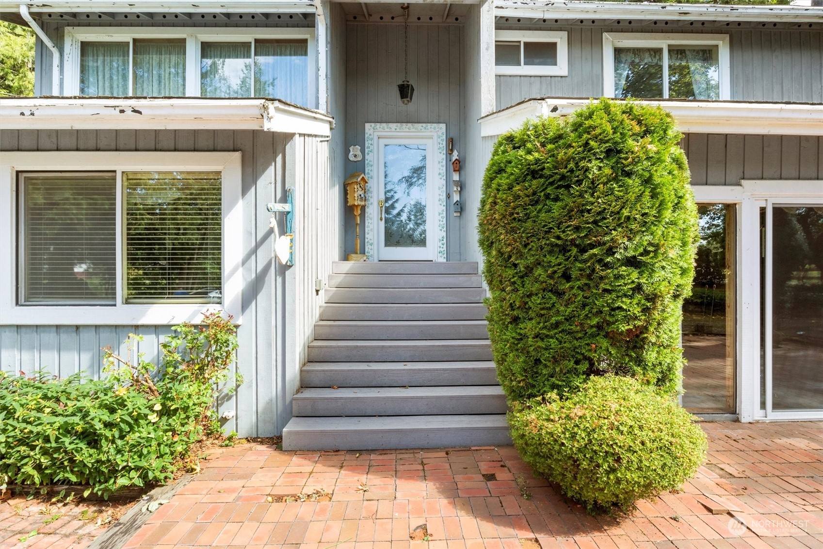 5570 Starry Road Bellingham, WA 98226 - Photo 3 of 34 a view of a house with potted plants