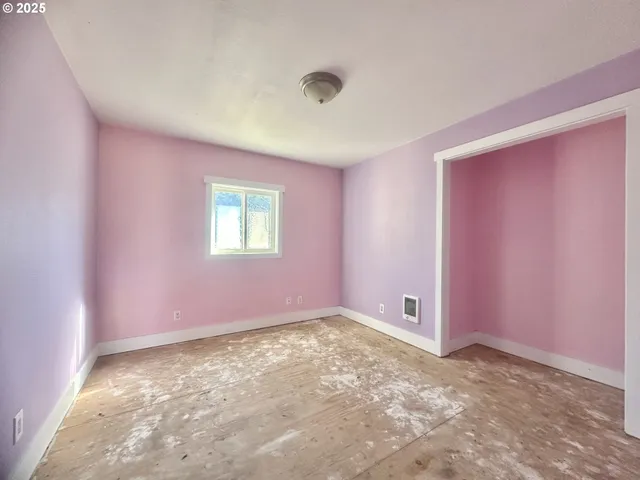 a bathroom with a double vanity sink mirror and toilet