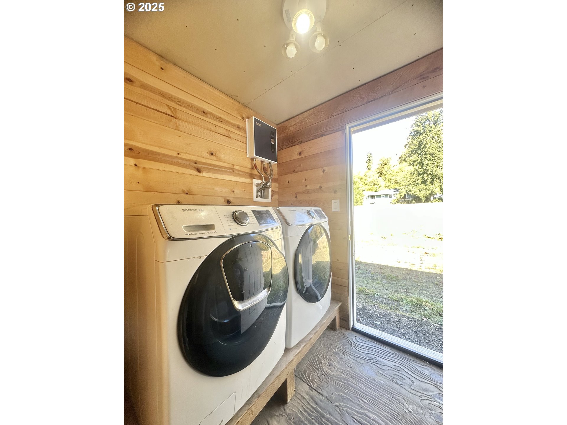 24275 Bunn Creek Road Cloverdale, OR 97112 - Photo 22 of 32 a utility room with dryer and washer